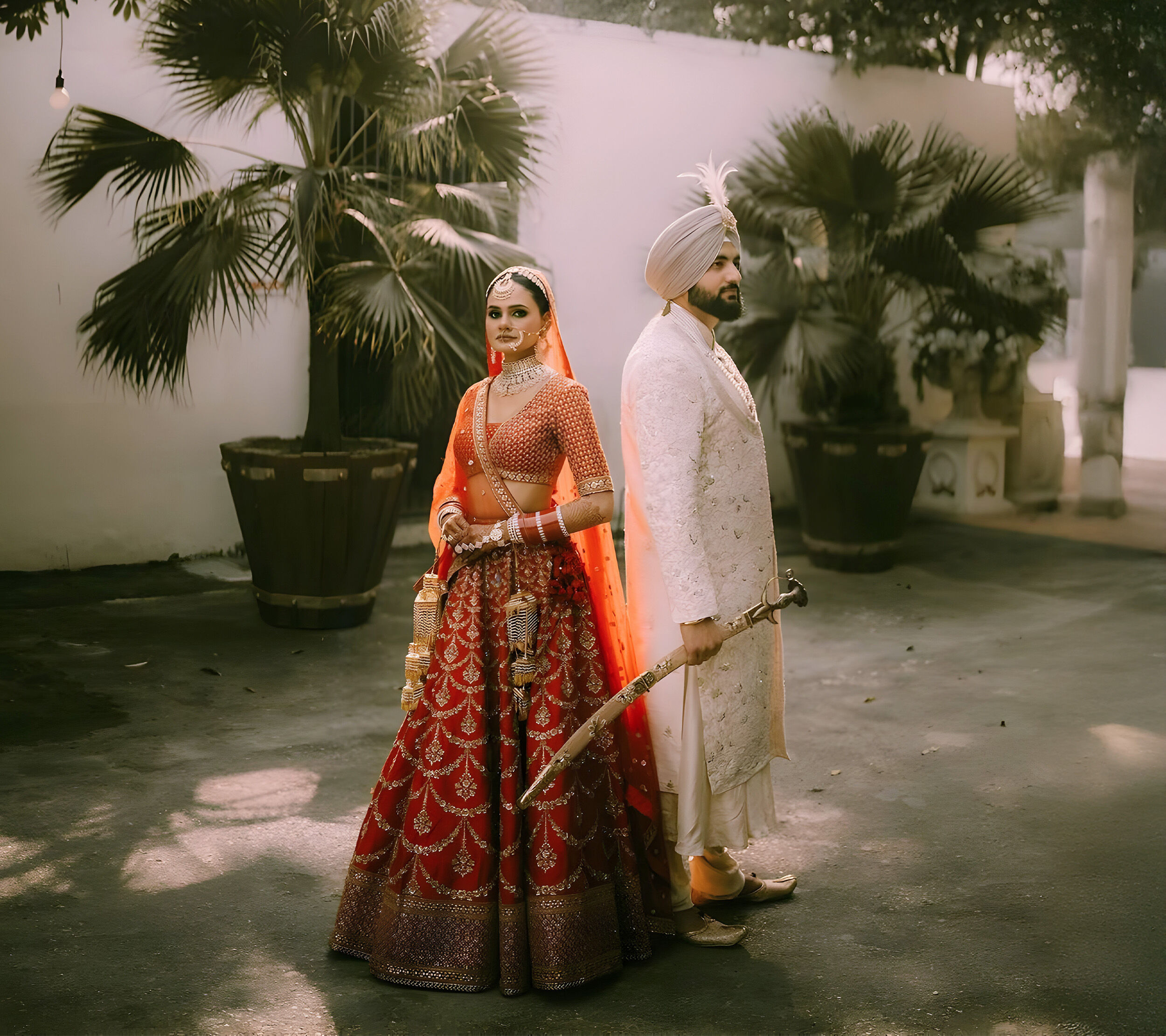 A punjabi couple poses for for their wedding photoshoot
